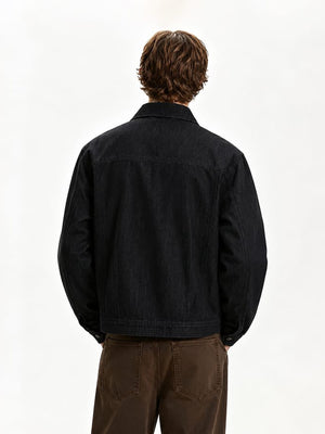Cropped Black Denim Trucker Jacket with Buckle Tabs – on model, back | XoKool