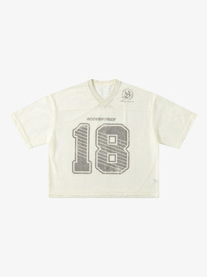 Mesh football jersey – Cream V-neck '18' flat lay | XoKool