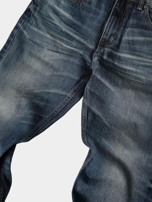 Dunkelblaue Baggy Jeans mit Whiskering – Whiskering im Detail | XoKool