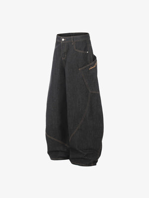 Jeans barrel índigo oscuro con costuras naranjas – vista lateral plana | XoKool