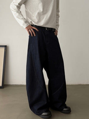 Dark Indigo Barrel Leg Jeans with Curved Seams – on model front | XoKool