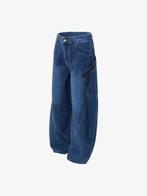 Jeans barrel curvos en lavado oscuro – vista lateral plana | XoKool