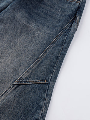 Jeans herradura en lavado oscuro – detalle de la costura curva | XoKool