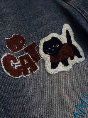 Cartoon patch jeans – 'CAT' patch close-up | XoKool