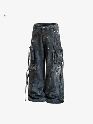 Cargo Jeans im Dirty Wash mit Farbspritzern – vorne flach liegend | XoKool