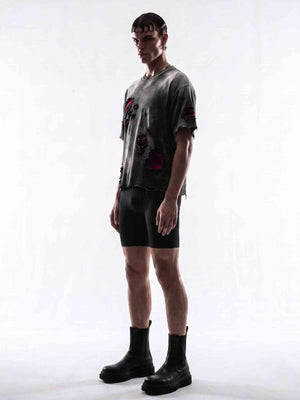Distressed Oversized Tee with Red Underlayer – on model, side | XoKool
