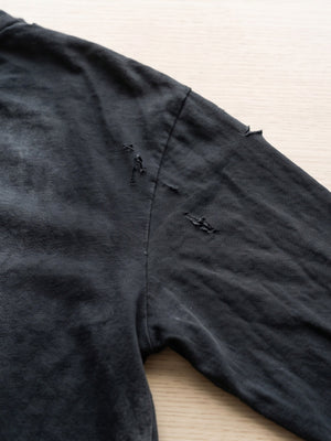 Distressed layered tee – shoulder rip close-up | XoKool