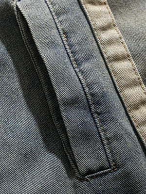 Distressed denim jacket – contrast placket stitching close-up | XoKool