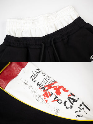 Patchwork sweatpants – Black, print panel close-up | XoKool