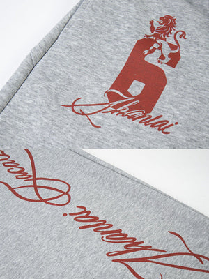 Lion Graphic Sweatpants – lion graphic and script close-up | XoKool