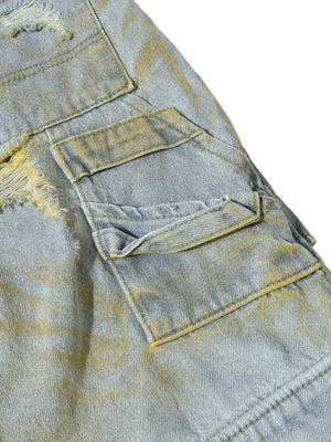 Jorts cargo rotos con efecto lavado sucio – detalle del bolsillo cargo lateral | XoKool