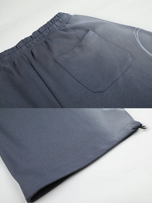 Faded sweatpants – Back pocket and toggle hem close-up | XoKool