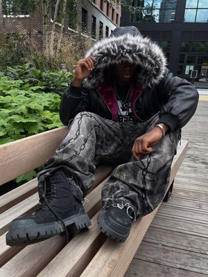 Faux leather fur hood bomber – street photo, seated | XoKool
