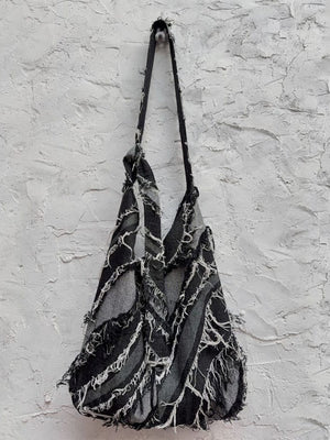 Frayed Patchwork Denim Hobo Shoulder Bag – Bag hanging on wall | XoKool