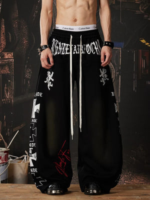 Gothic Print Washed Wide Leg Sweatpants – Black, on model front | XoKool