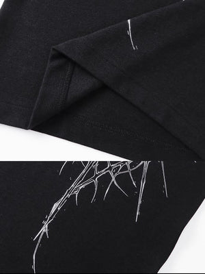 Thorn print tank top – hem and print close-up | XoKool