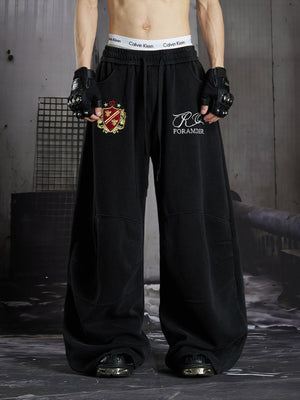 Embroidered sweatpants – Black, on model, front | XoKool