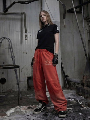 Embroidered sweatpants – Red, on model, standing | XoKool