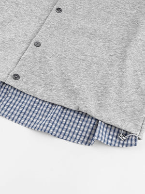 Sleeveless layered shirt – hem buttons close-up | XoKool