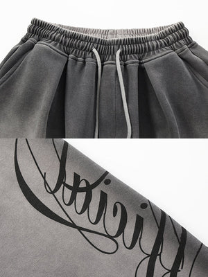 Graue Wide Leg Jogginghose mit Schriftzug-Print – Nahaufnahme von Bund und Schriftzug-Print | XoKool
