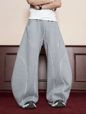 Heather Grey Barrel Sweatpants with White Piping – on model front close | XoKool