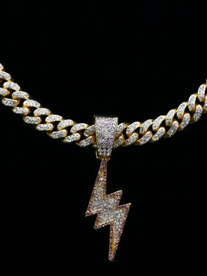 Lightning bolt necklace – Gold pendant close-up, black background | XoKool