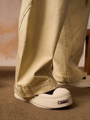 Yellow barrel jeans – on model, hem | XoKool