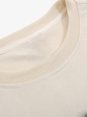 Brush Stroke Letter Graphic Tank Top, Cream or Black – collar close-up | XoKool