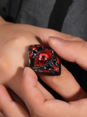 Gothic Red Eye Statement Ring in Gunmetal – Held between fingers | XoKool