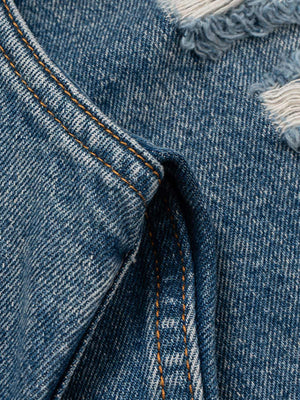 Jorts azules rotos con hebillas laterales – detalle de la bragueta delantera | XoKool