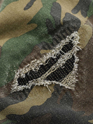 Camo cargo pants – ripped patch close-up | XoKool