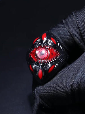 Red eye ring – On dark fabric, dramatic light | XoKool
