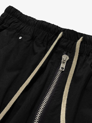 Wide leg cargo pants – waistband zip and drawstring close-up | XoKool