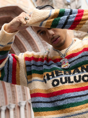 Fuzzy striped sweater – on model, sleeve close-up | XoKool