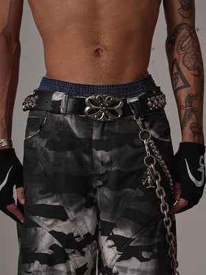 Pyramid Studded Belt with Big Oval Buckle – Black, on model with camo pants and wallet chain | XoKool