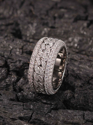 Iced Out Cuban Link Spinner Ring – Silver, on dark rock side view | XoKool