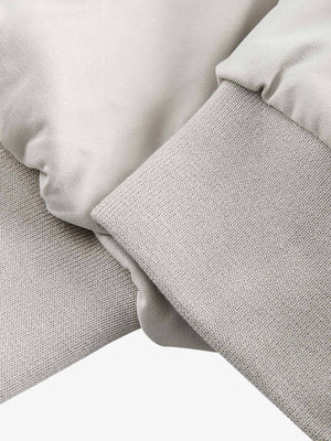 Layered hooded bomber – Cuff close-up | XoKool