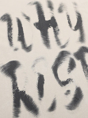 Brush stroke letter tank – front print close-up | XoKool