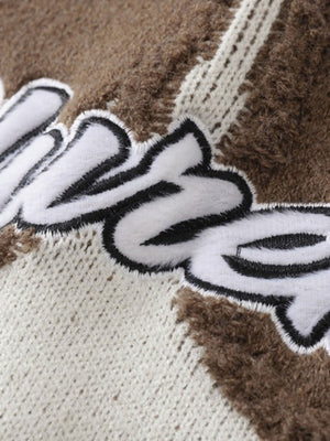 Oversized Strick-Pullover mit Stern und ausgefranstem Saum – Nahaufnahme des Schriftzug-Patches | XoKool