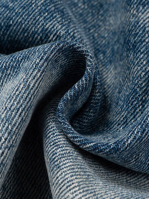 Jorts azules rotos – detalle del efecto remolino de la tela | XoKool
