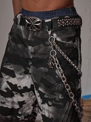 Studded belt – Black, on model close-up with chain | XoKool