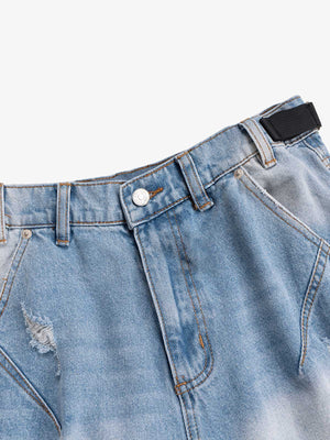 Shorts cargo desgastados – detalle de la cintura frontal y el ajustador | XoKool