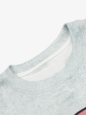 Gesprenkeltes Oversized Longsleeve mit Kreis-Emblem – Kragen im Detail | XoKool