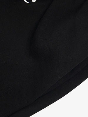 Shorts con doble cintura – detalle de la curva del dobladillo | XoKool