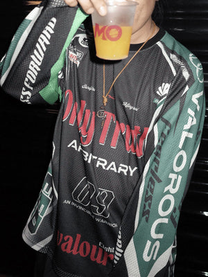 Motocross jersey – Black / Green, on model at night | XoKool