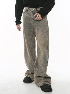 Mud Wash Wide Leg Jeans in Tinted Brown – on model, side | XoKool