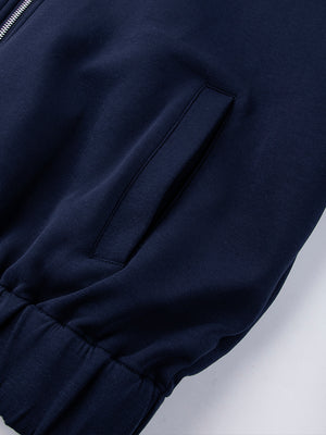Marineblaue Trainingsjacke – Nahaufnahme Tasche und Bündchen | XoKool