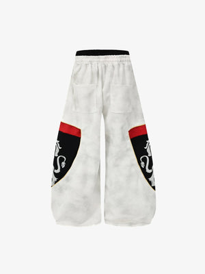 Off White Patchwork Sweatpants with Lion Panels – back flat | XoKool