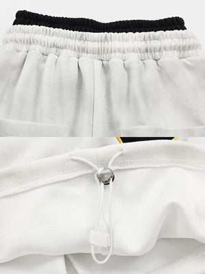 Patchwork Sweatpants – waist and hem toggle close-up | XoKool