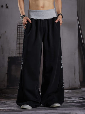 Pantalones deportivos oversize de pierna ancha con cintura en contraste – Negro, en modelo de frente | XoKool